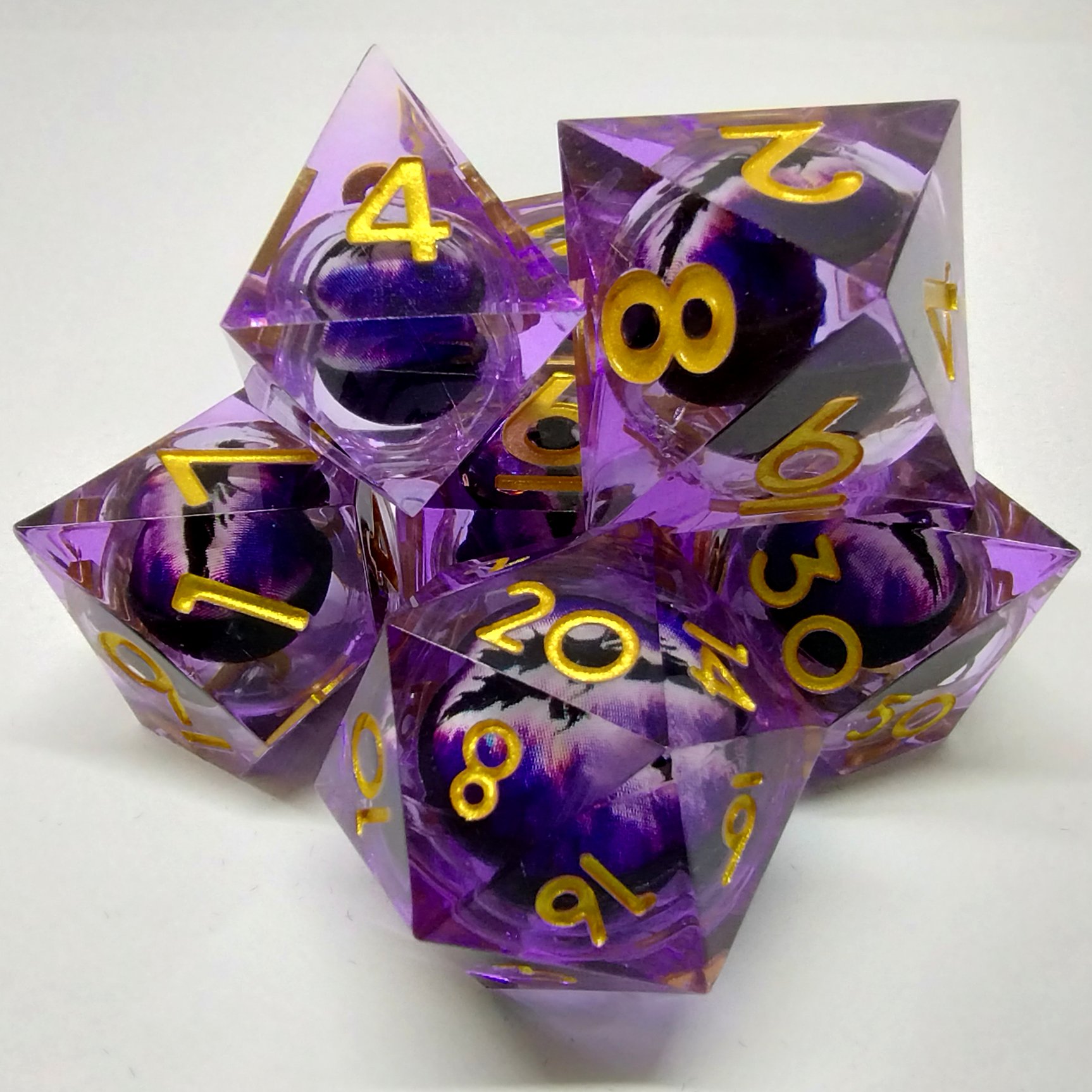 Liquid Core Dragon Eye Dice Kit - Purple in Black Suedecloth Pouch